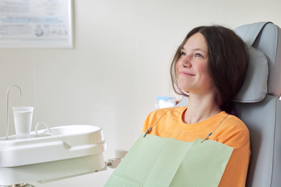 Teenager preparing to have wisdom teeth extracted